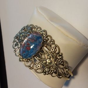 Antique style brass cuff bracelet design teal, blue, bronze, and pink